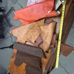 Assorted colors and sizes of various leather pieces