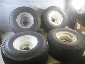 (EC1) 4 - Assorted 4-Lug Lawn Tractor Rims with Tires