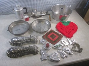 (A-2) Assorted Vintage 1950s Aluminumware Cookie Cutters, Angel Food Cahe Pan, Meat Grinder and Misc Other