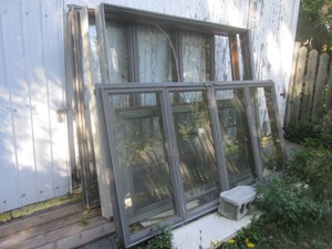 (OS) Assortment of House Windows with Screens (Assorted Sizes) and 2 Sliding PatioDeck Doors - All Glass Was Seal Tested and Passed After Removal