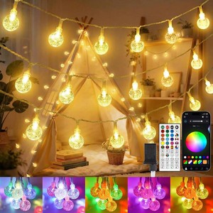 $32 OMIKA 50FT 100 LED Outdoor String Lights Plug in, RGB  Warm White Smart Crystal Globe Lights, Dimmable APP & Remote Control Fairy String Lights with Timer, Music Sync for Patio Garden Party D cor