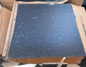 box of Armstrong flooring tiles