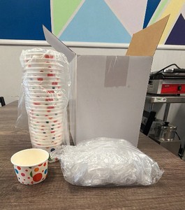 box of small sample cups and spoons