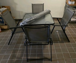 Patio table w 4 chairs and Brand new Umbrella