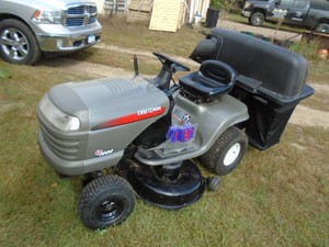 Craftsman riding lawn mower. LT1000. 46� Deck with bagger. 21.5 hp motor. Runs & drives. As shown.