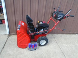 Troy Bilt snow blower. Tested & works. Looks nearly new. Model 2410. As shown.