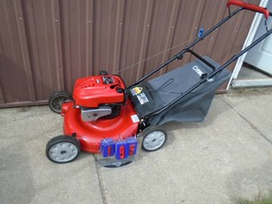 Troy Bilt 21� 6.5 hp push mower with bagger. Tested & works. As shown.