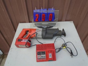 Milwaukee 18 volt cordless sawzall with battery & charger. Very little use. Tested & works. As shown.