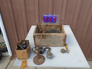 Wood box of clevis pins &hog scrappers. As shown.