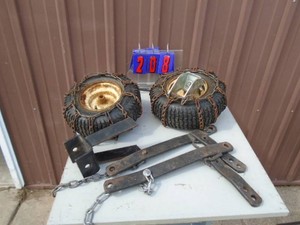 Pair of snow blower tires, heavy duty brackets & trailer jack foot. As shown.