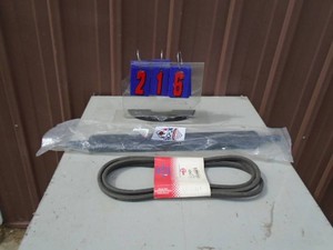 Tractor draw bar hitch & mower belt. As shown.