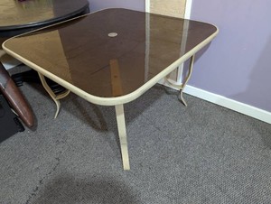 Glass top patio table with umbrella