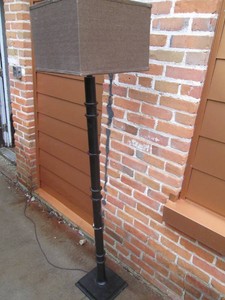 Classy floor lamp with a solid metal base