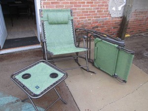Pair of patio folding rocking chairs and a matching end table