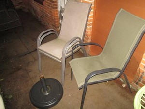 3 Patio chairs with a metal umbrella base