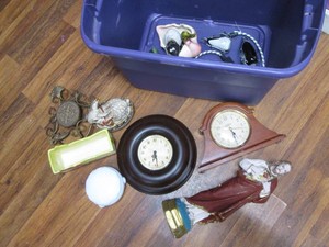 Covered tote filled with collectible glassware and more