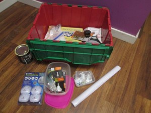 Latch top tote filled with mostly new home improvement supplies