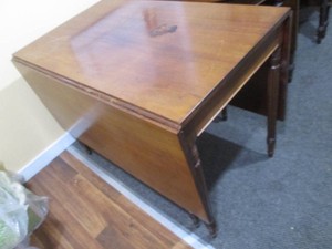 Ornate drop leaf table