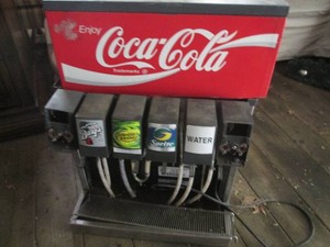 Coca Cola beverage dispenser, as pictured