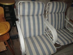 2 Metal framed patio chairs with cushions
