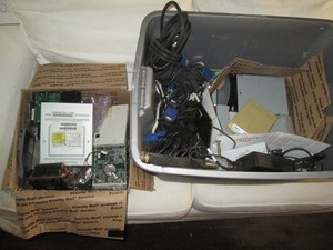 Tote filled with assorted computer components