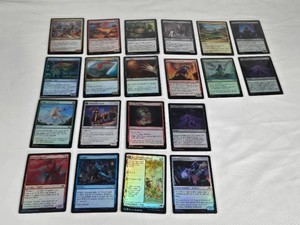 Lot of Magic The Gathering Foil Cards Including Tenth District Legionnaire, Storm Fleet Pyromancer, Skyswimmer Koi, Winged Coatl, Might of Old Krosa, Amaranthine Wall and Purphoross Emissary