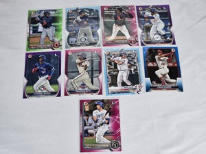 Lot of 9 Numbered Baseball Cards Featuring Yhonkensi Noel, Carlos Aguiar, and Logan OHoppe with Variants.
