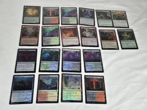 Lot of 20 Magic The Gathering Foil Cards including Seshiros Living Legacy, Bloodfell Caves, Nameless Conqueror, Jungle Hollow, Reckoner Shakedown, Thornwood Falls