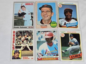 Lot of 6 Vintage Baseball Cards Featuring Bruce Sutter, Lou Brock, Reggie Jackson, Joe Morgan, Gaylord Perry, and Brooks Robinson.
