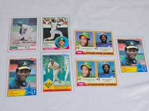 Lot of 7 Rickey Henderson Baseball Cards featuring Topps Stolen Base Leaders and All Star series