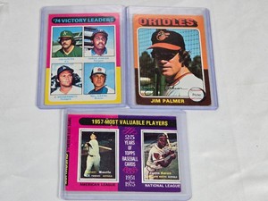 Lot of 3 Baseball Cards Featuring Jim Palmer, Mickey Mantle, and Hank Aaron with 1974 Victory Leaders Card - Includes Vintage Topps Cards from 1975.