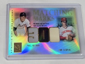 Phil Niekro and Tom Seaver 2002 Dual Relic Topps Tribute Matching Marks Game-Worn Uniforms #MM-NS - Atlanta BravesCincinnati Reds Baseball Card