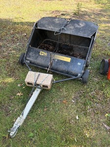 Pull behind yard bagger