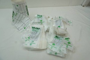 small and large parts bag 7 full rolls and a number of small bags