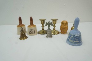 variety of ceramic and brass bells