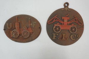 2 vintage cast iron Fire Department and Fire Insurance markers 11 and 12 diameter