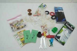 golf tees, club weights, gloves, divot tenders, score cards