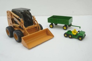 Case Skid Loader 116 scale by Ertl, John Deere 6x4 Gator, John Deere wagon