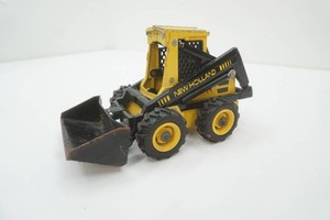 New Holland skid steer #2898, cast iron, 9 long