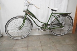 vintage Montgomery Ward Hawthorne Step through Cruiser with headlight and back rack in Green and white 1950s era