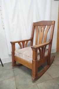 mission oak rocking chair with upholstered cushion