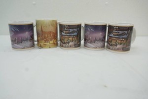 group of Terry Redlin print coffee cups
