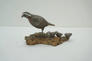 hand carved wood quale with 3 chicks on a piece of driftwood6 tall