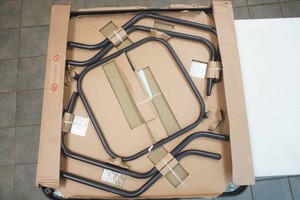 34 glass top  patio table with metal frame NEW has never been assembled