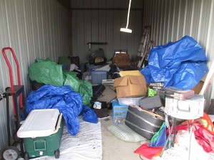 Content of 10 x 20 foot storage unit   Buyer responsible for taking everything inside unit, ensuring unit is empty upon completion and no trash left behind.  THIS UNIT IS LOCATED APPROXIMATELY 10 MILES NORTH OF HUTCHINSON.