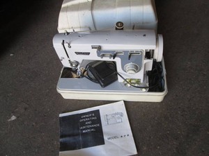 Hilton sewing machine in a case