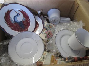 Box filled with fine china