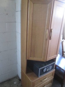 Corner cabinet with built in programmable combination safe