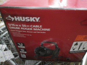 Husky drum auger machine