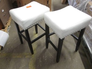 Pair of padded stools, one is missing a bottom cross piece